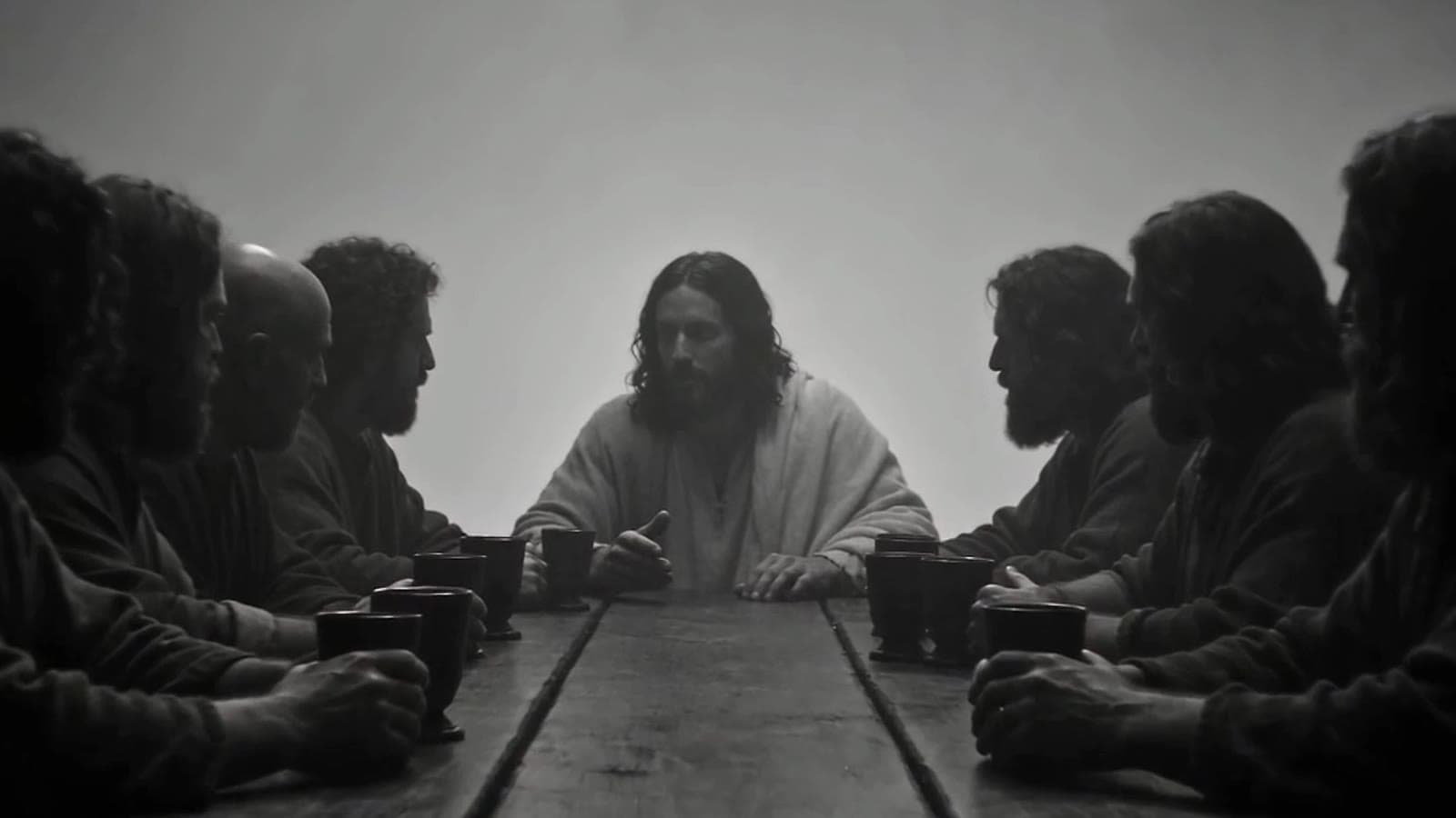 Jesus and the twelve disciples at the Last Supper table, in black and white