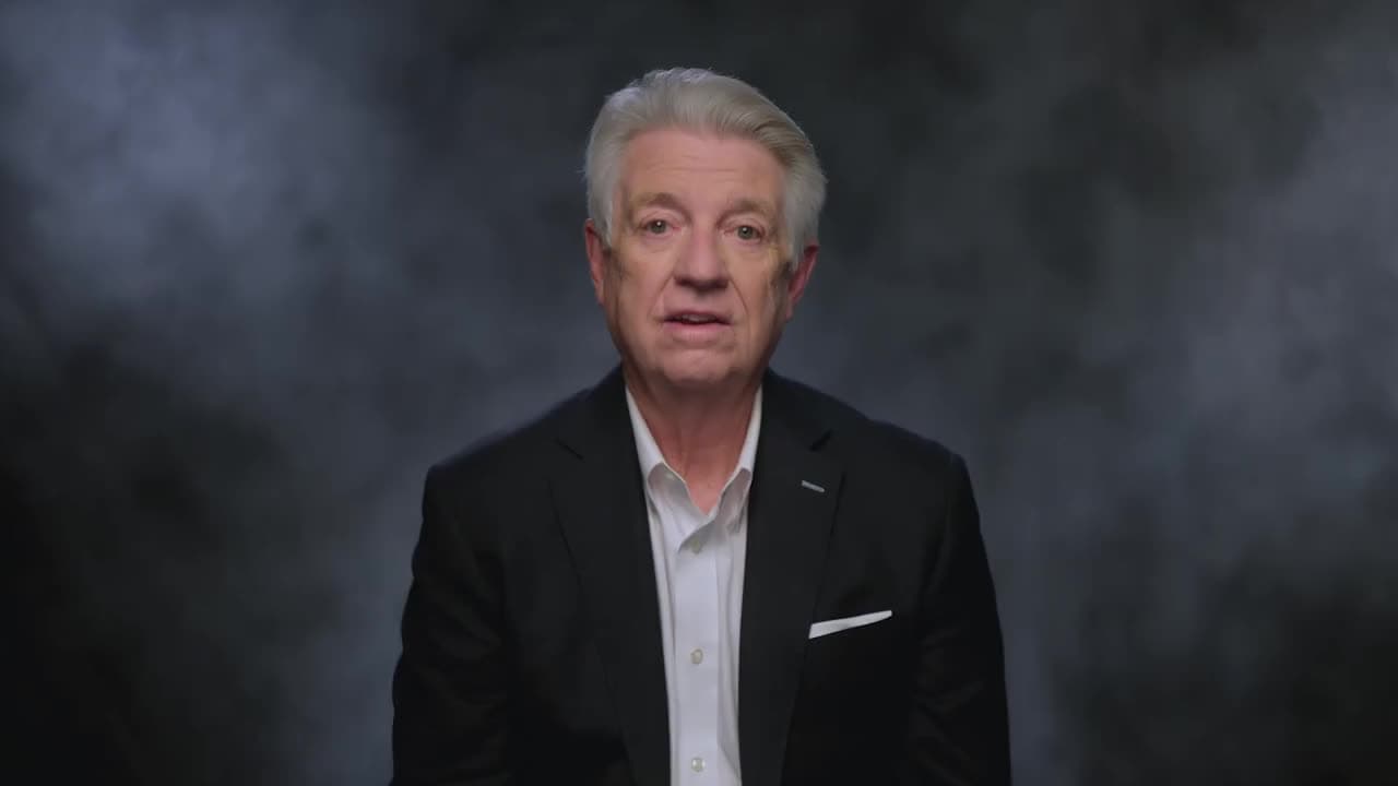 Jack Graham speaking to camera in the studio, the raw reference video