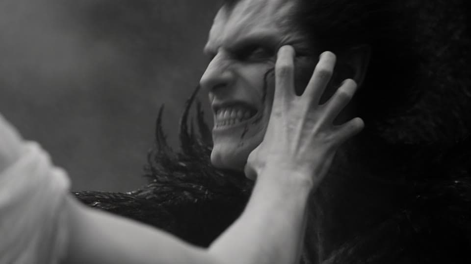 Shot 2: She claws at his face. He snarls and throws her off.