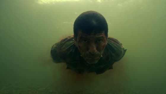 Close-up: the same soldier underwater