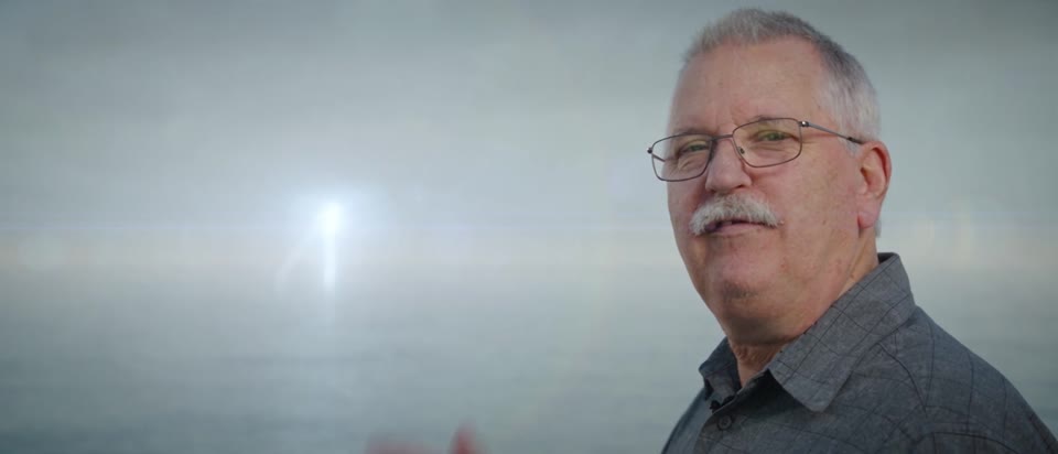 Gary Livengood in the final stretch of the trailer, facing the light over the crystal sea